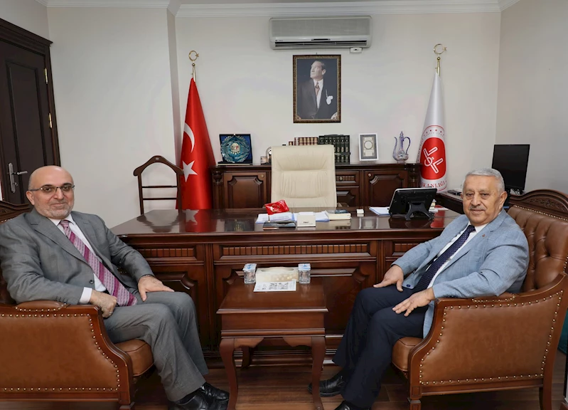 Afyonkarahisar Belediye Başkanı Mehmet Zeybek, yeni İl Müftüsü Lütfü İmamoğlu