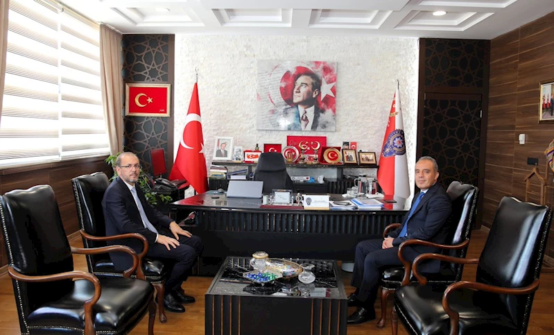 AFSÜ Rektörü Okumuş